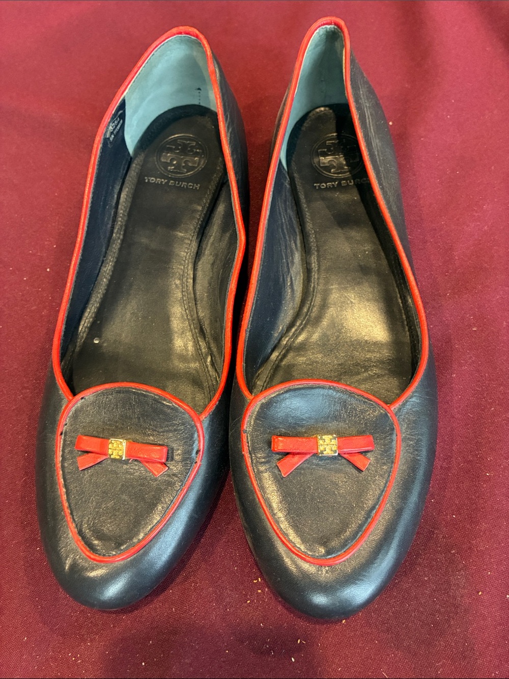 Tory Burch Black Leather Ballet Flats with Red Trim and Bow Accent